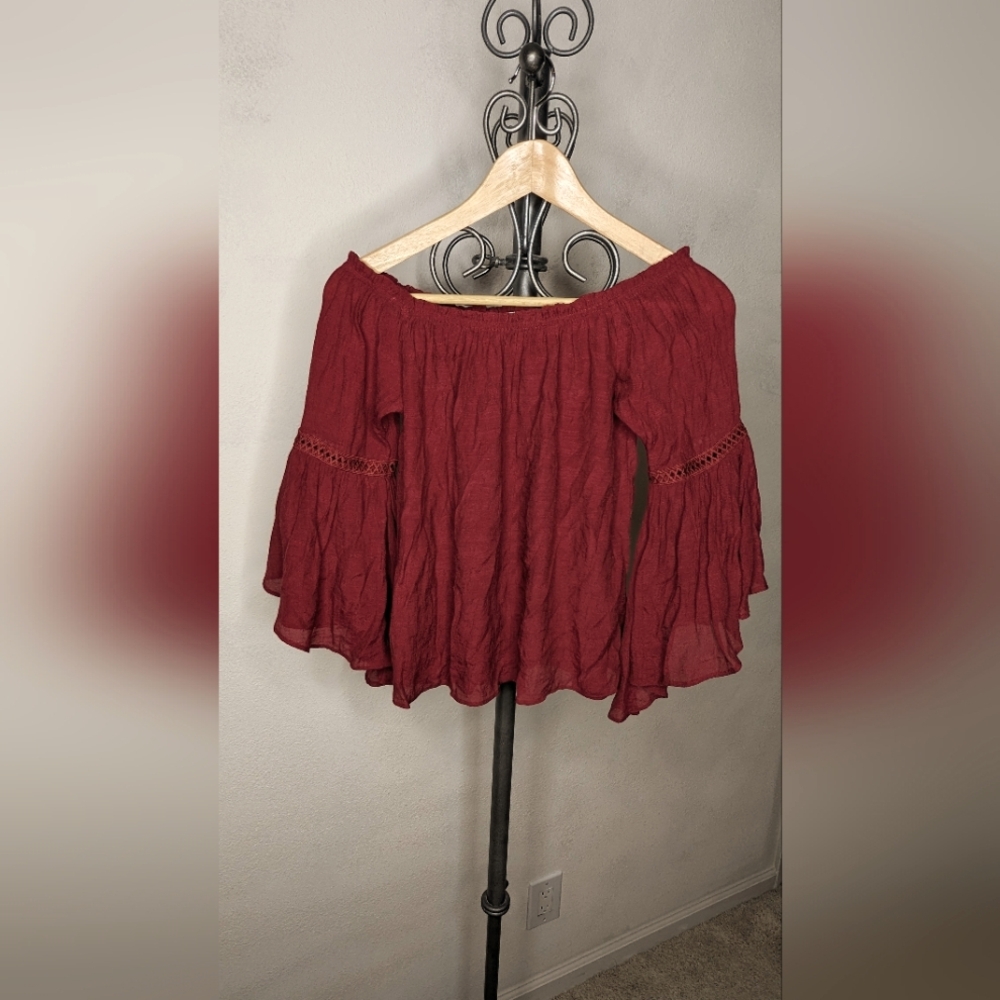 Flowy off the shoulder blouse with bell shaped sleeves